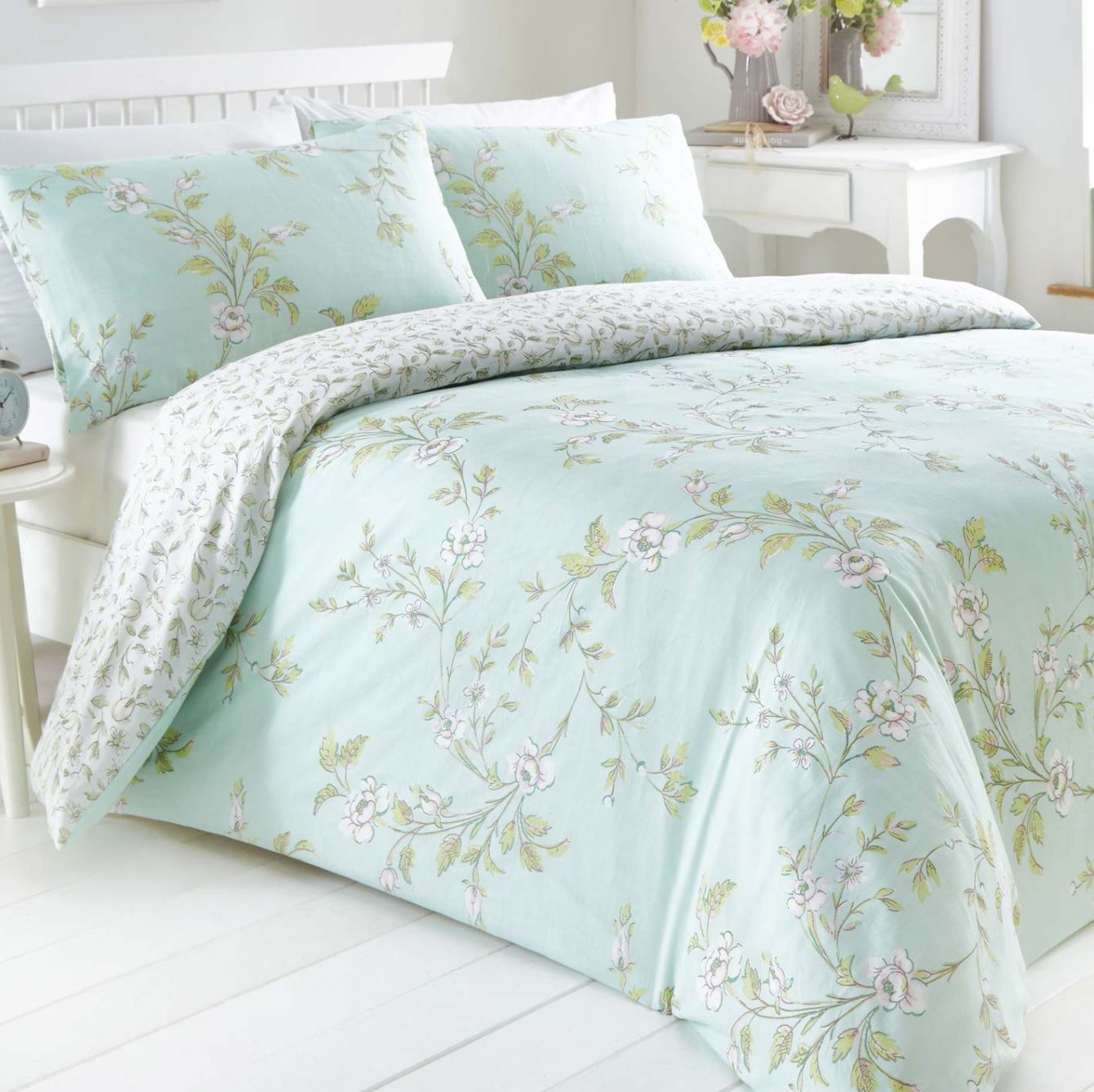 Featuring classic painted flower blossoms in subtle shades of duck egg blue and green
