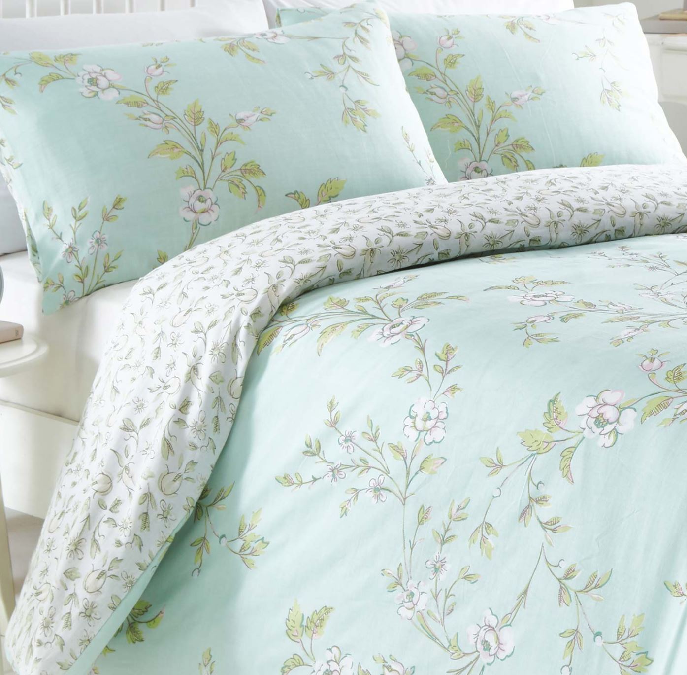 Featuring classic painted flower blossoms in subtle shades of duck egg blue and green