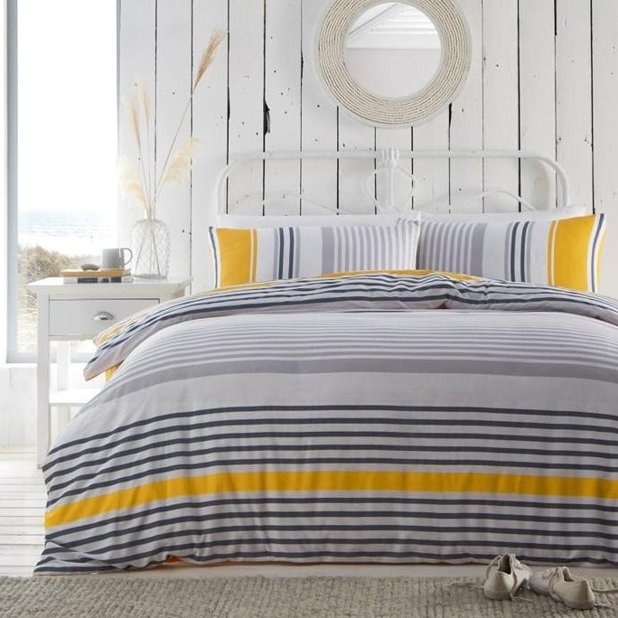  Nautical Stripe duvet set in a bright ochre and grey colour scheme. The reversible bedding is two designs in one, with a top heavy border becoming the bottom border on the reverse